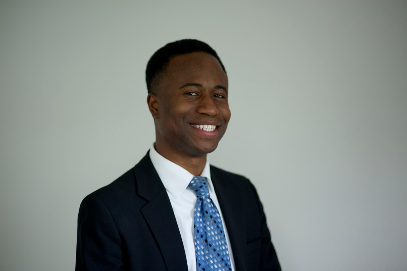 Portrait — approved headshot (hi-res)